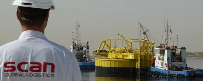 Man looking at the oil and gas drilling platform